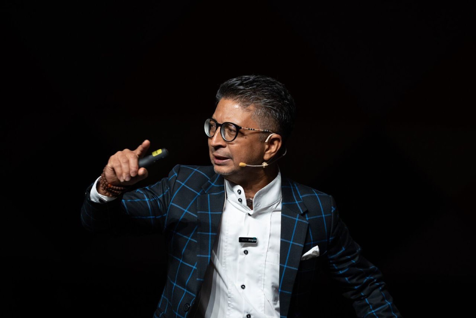 Dr. U2Kumar on stage — 30 years transforming sales teams across Asia Pacific